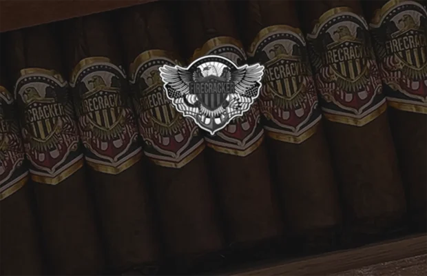 Close-up of United Firecracker cigars neatly displayed with vibrant patriotic cigar bands featuring an eagle and American flag motif, emphasizing bold flavors and premium craftsmanship for cigar aficionados.