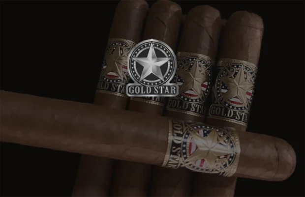 Premium Goldstar cigars artistically arranged to showcase their elegant bands featuring a bold golden star against a patriotic American flag motif, symbolizing quality craftsmanship and sophisticated flavor for cigar enthusiasts.