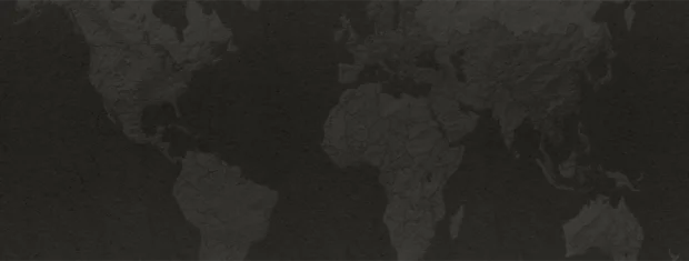 Dark, textured grayscale world map background emphasizing global presence, suitable for showcasing international reach and connectivity